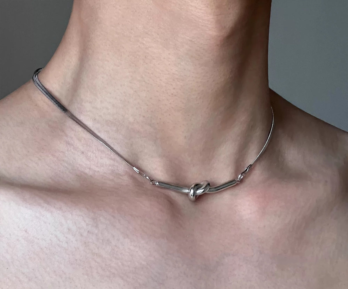 Ophion sculptural silver necklace with snake-bone links