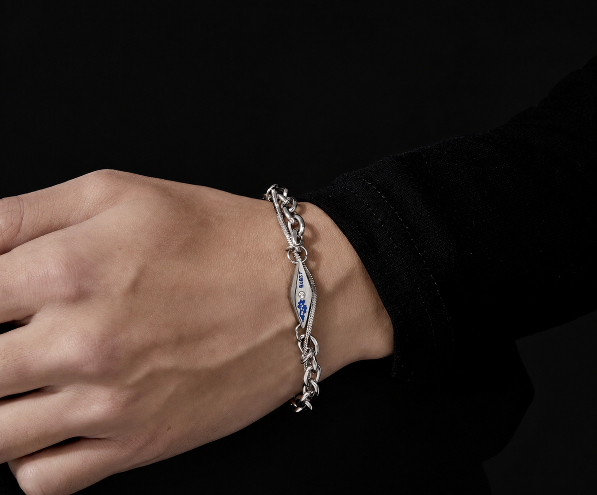 Vulcan wrapped double-chain sterling silver bracelet with engraved blue-detail plate