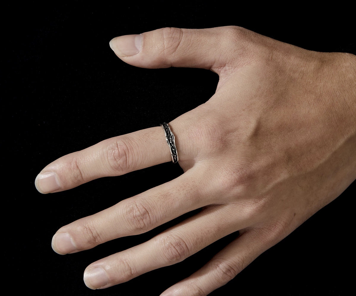 Chaos open 925 silver band with bright edges and raw texture