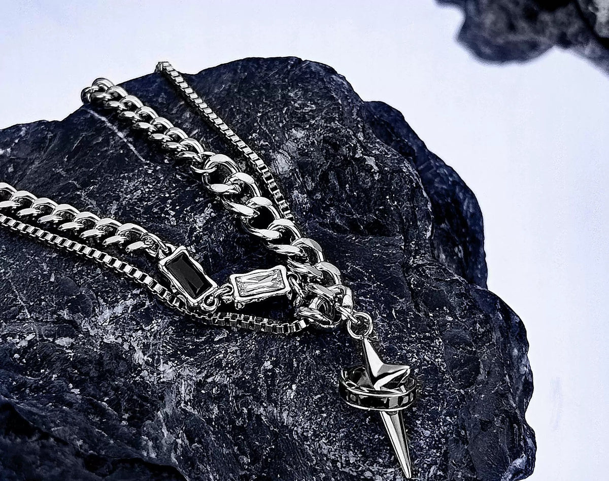 Astraea polished silver layered necklace and four-point star