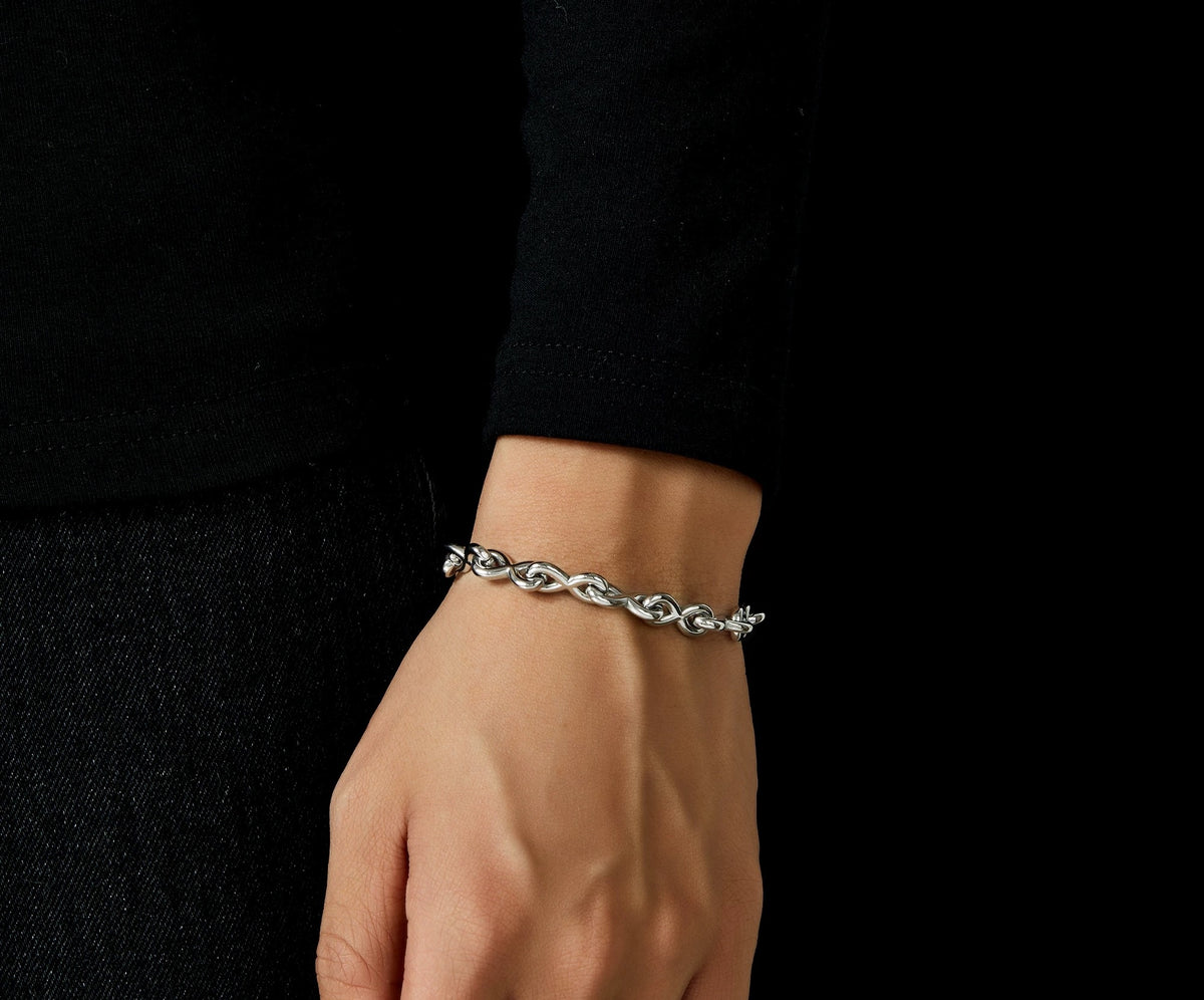 Charon silver bracelet with infinity-inspired link pattern