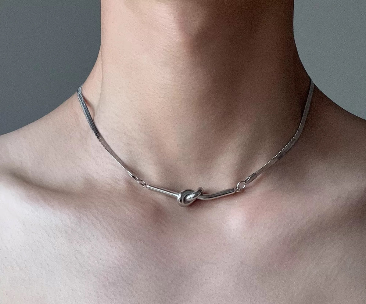 Ophion polished 925 silver knotted chain necklace
